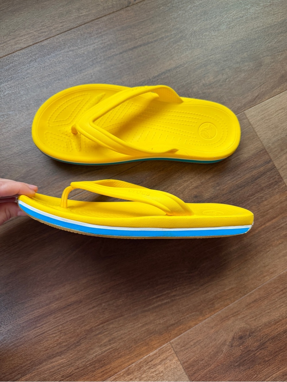 CROCS Yellow Flip Flops with Blue Side Stripes